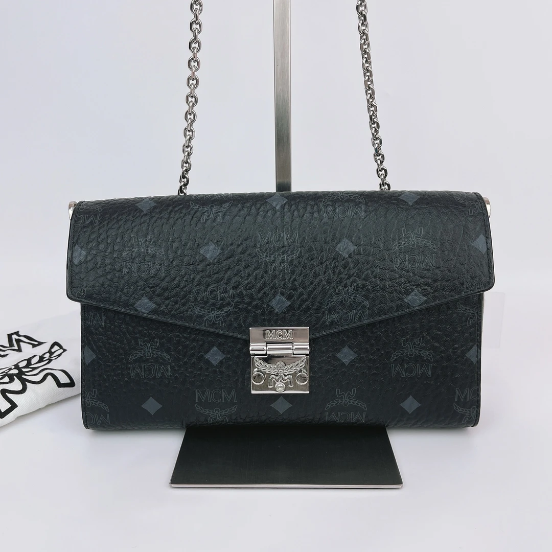 95新 MCM MCM 黑色老花单肩包底长23  M654