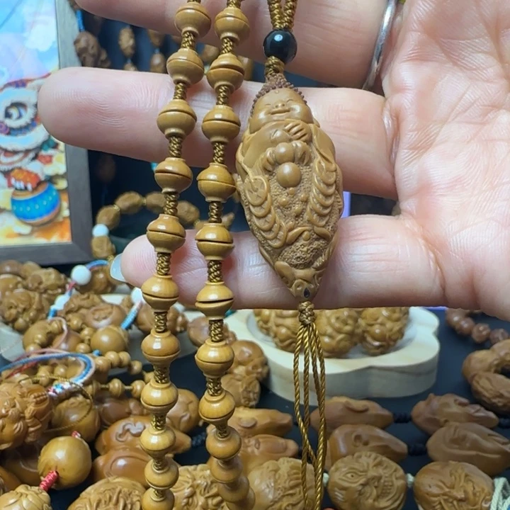 飞***。橄榄核手串/手链金饭碗