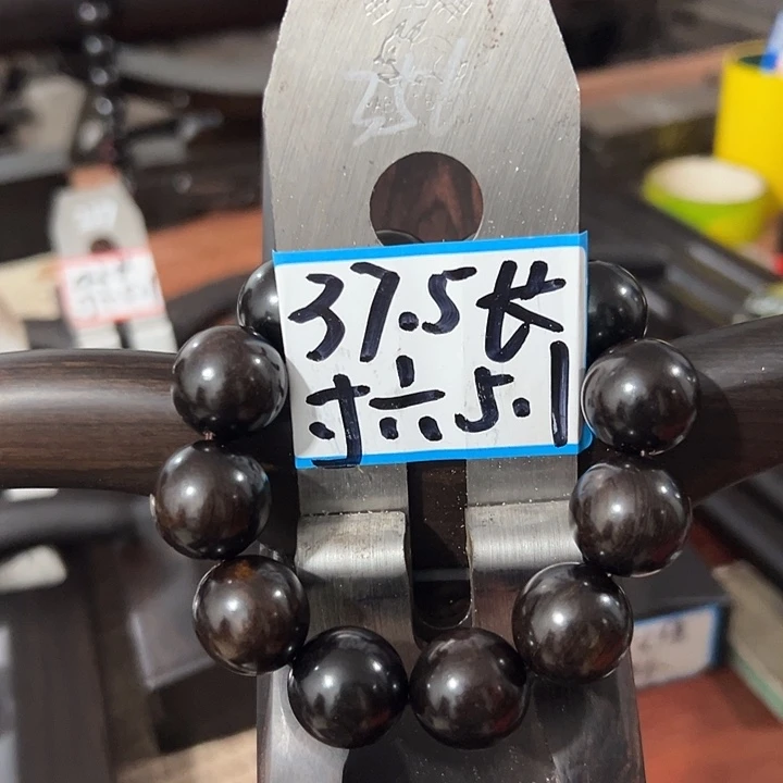 可***题紫光檀木料子一个