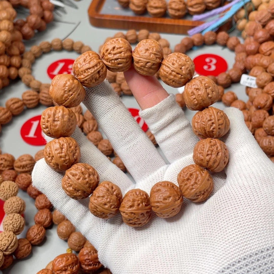 文玩核桃手串葒****?三棱四棱籽核桃串