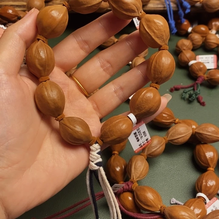 迪***d手串/手链橄榄核梅林铁18/25左右