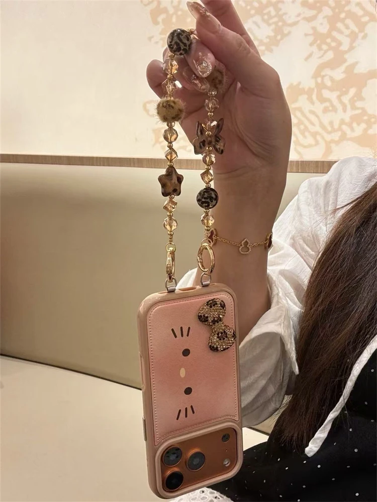 ins秋冬皮纹棕橘晕染Kitty表情适用iPhone17pro手机壳16promax女