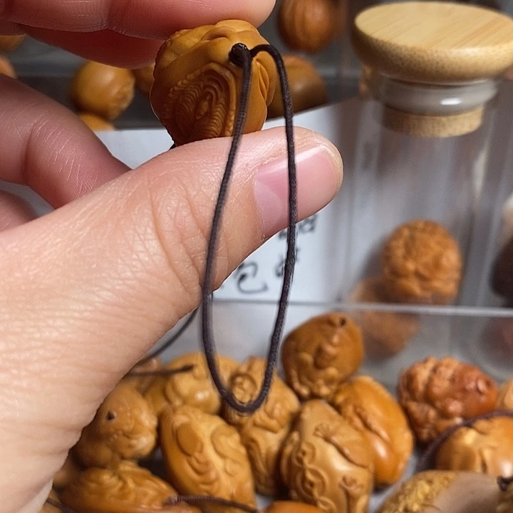 吊坠橄榄核生命，三面