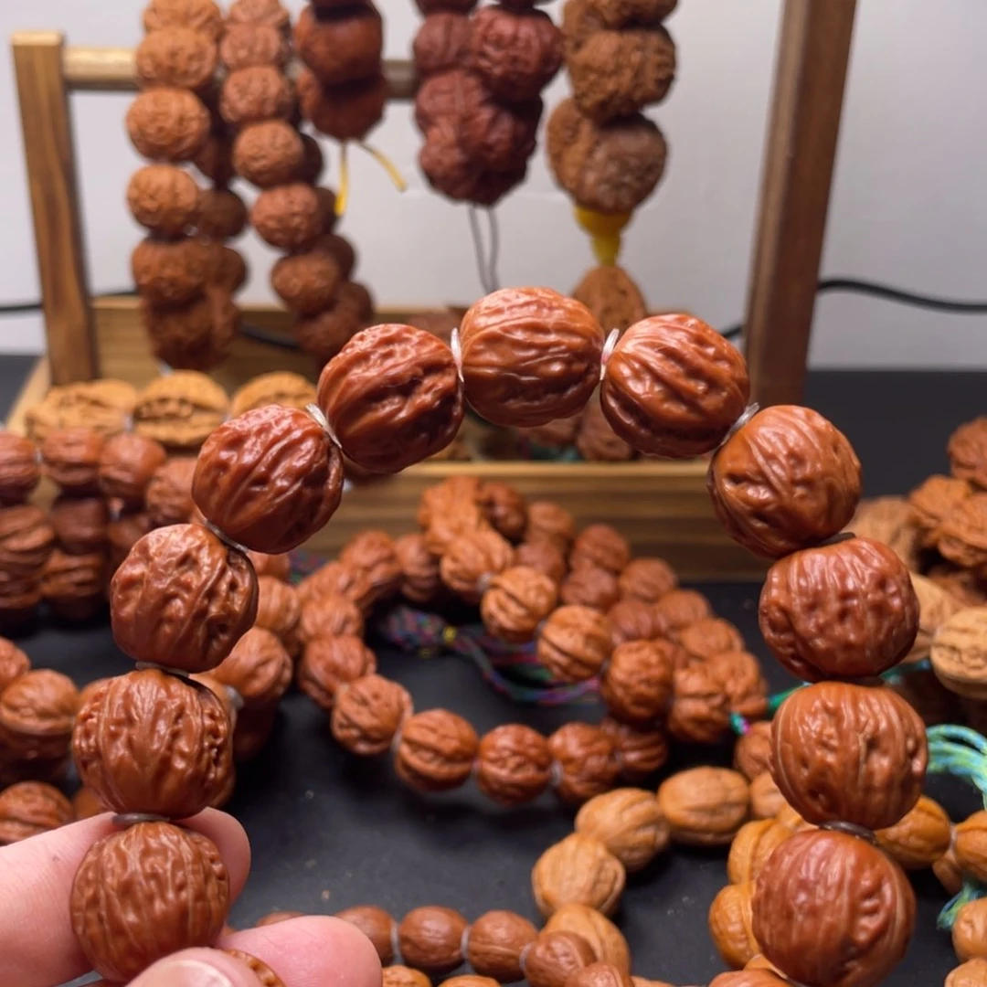 易***房文玩核桃吊坠树王