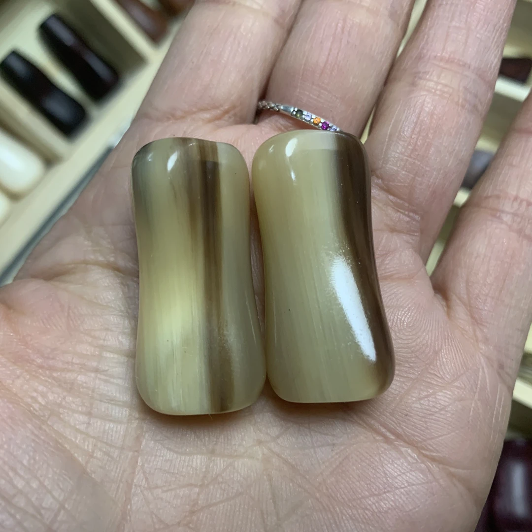 水滴轮花牛角s型握丸S/D牌常规款通用网秋粒握丸一对