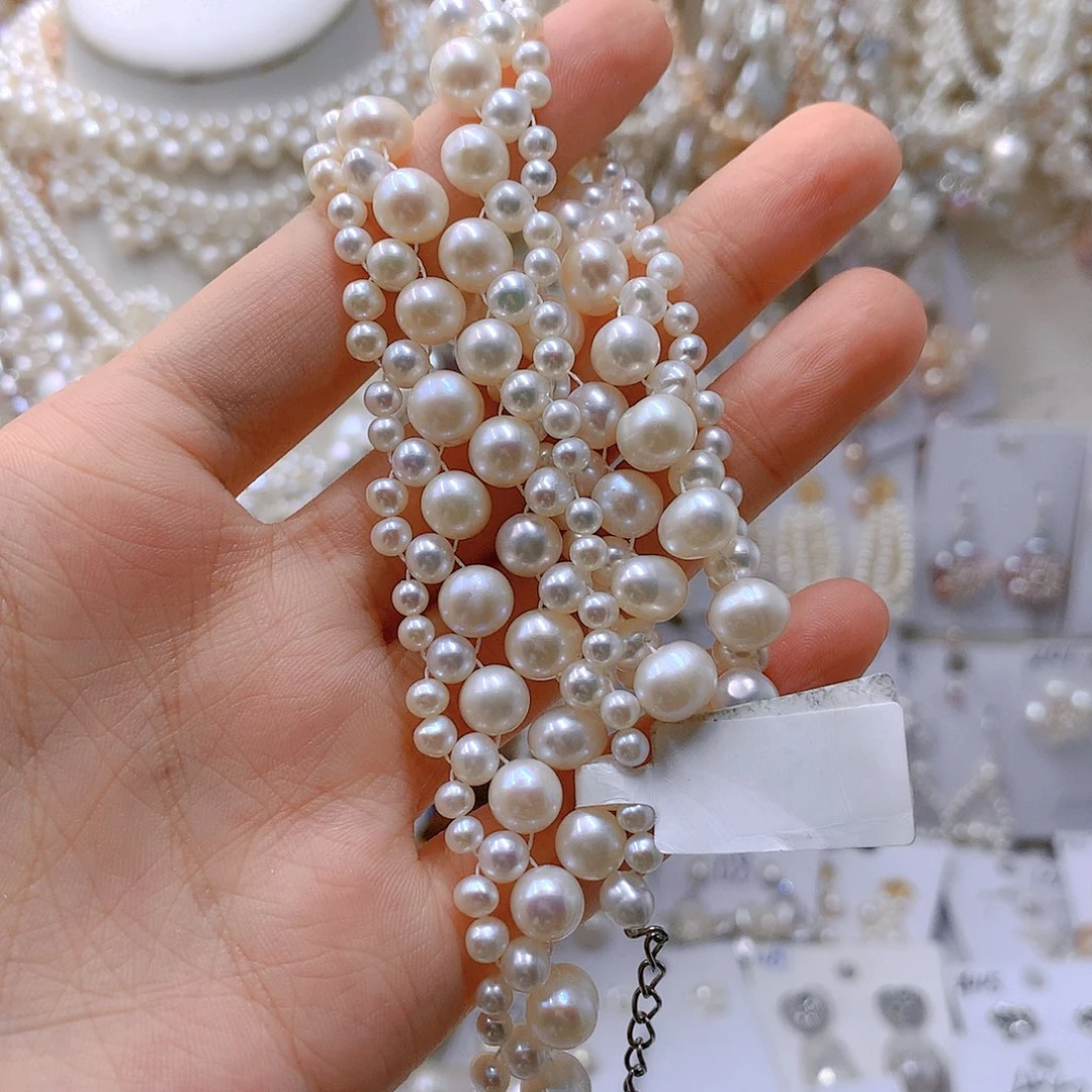 银S925镶嵌耳饰淡水珍珠最**花