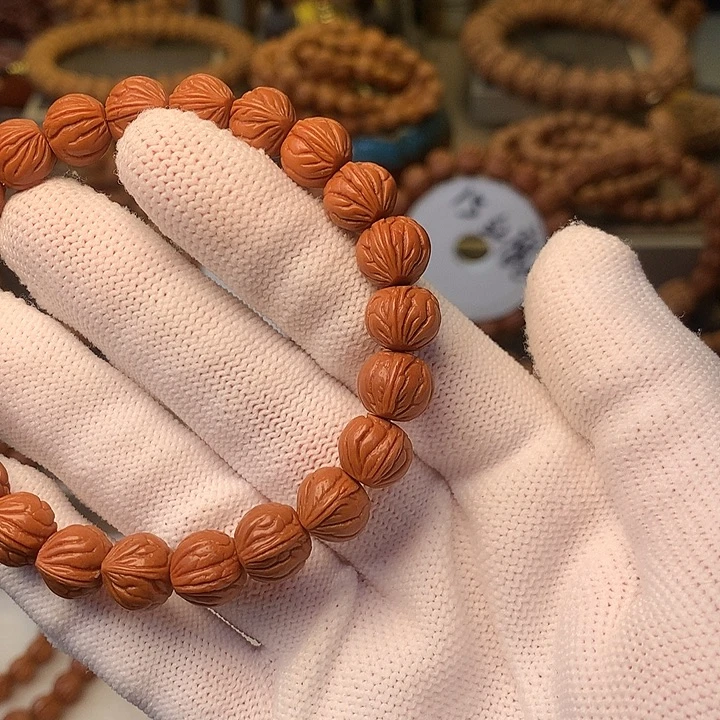 拼***搏手串桃核秦岭龙纹