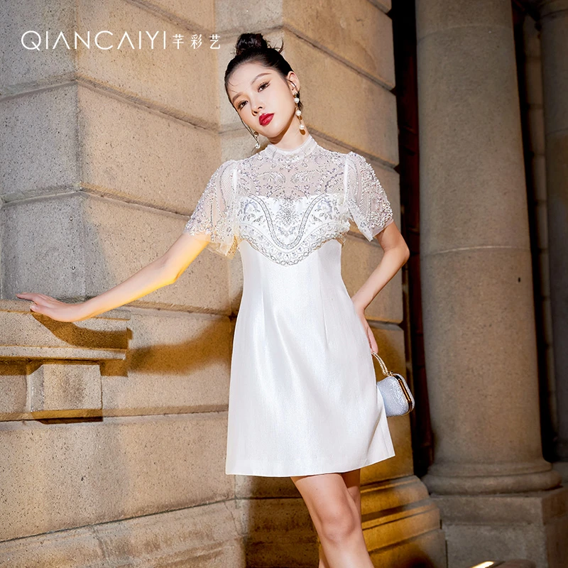 【思朵】Y24038蕾丝手工钉珠轻奢定制礼服女气质白色显示时尚连衣裙