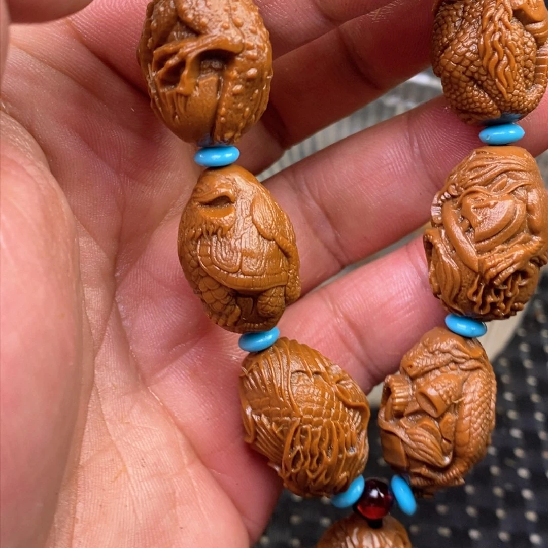 2.0.龙生九子雕刻手串雕刻手链是沉水核不是橄榄核是黄金树沉水核