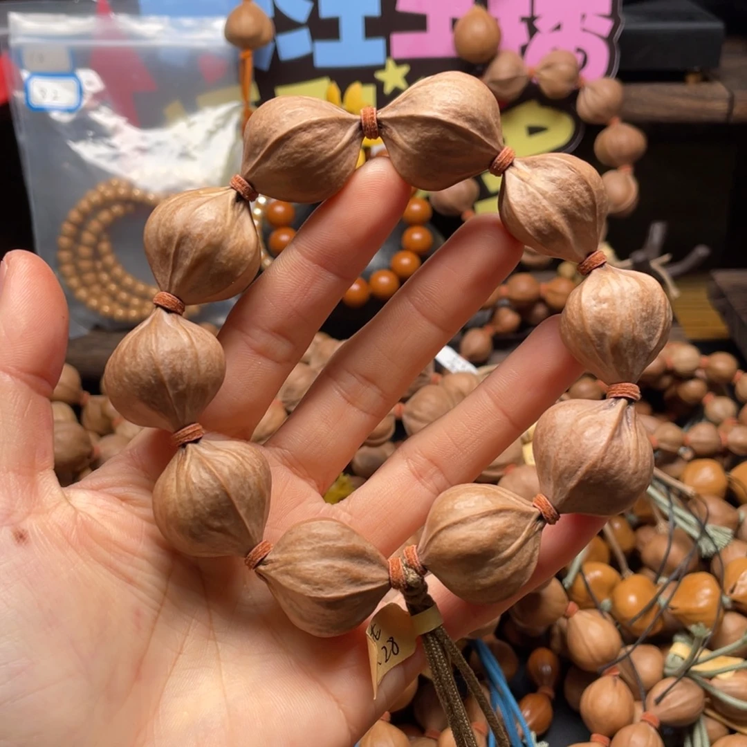 哎***租橄榄核吊坠四花铁核2628