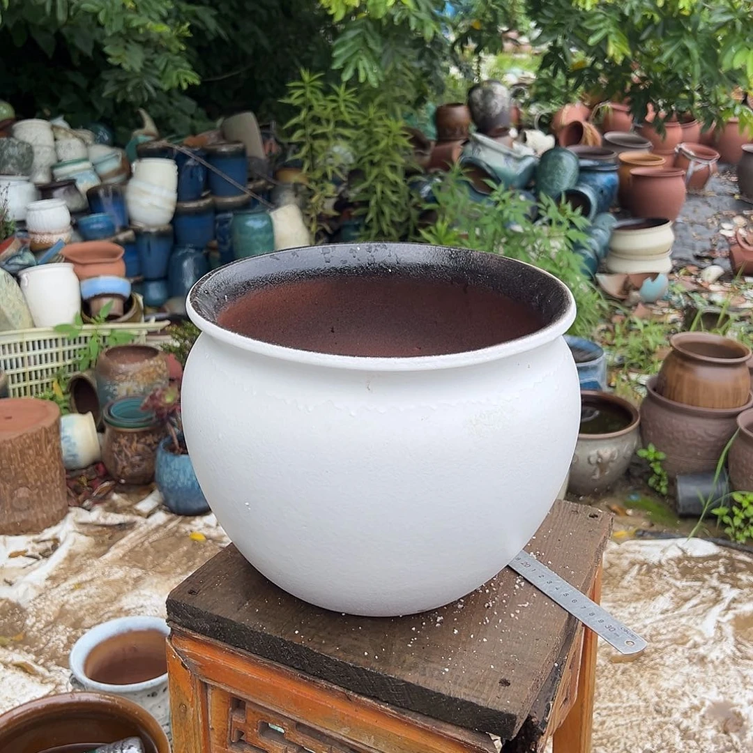 紫砂花盆口30高25一个白色