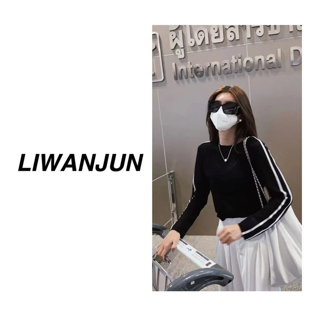 婉君【周末书店】两条杠网纱上衣LWJ23A1T230