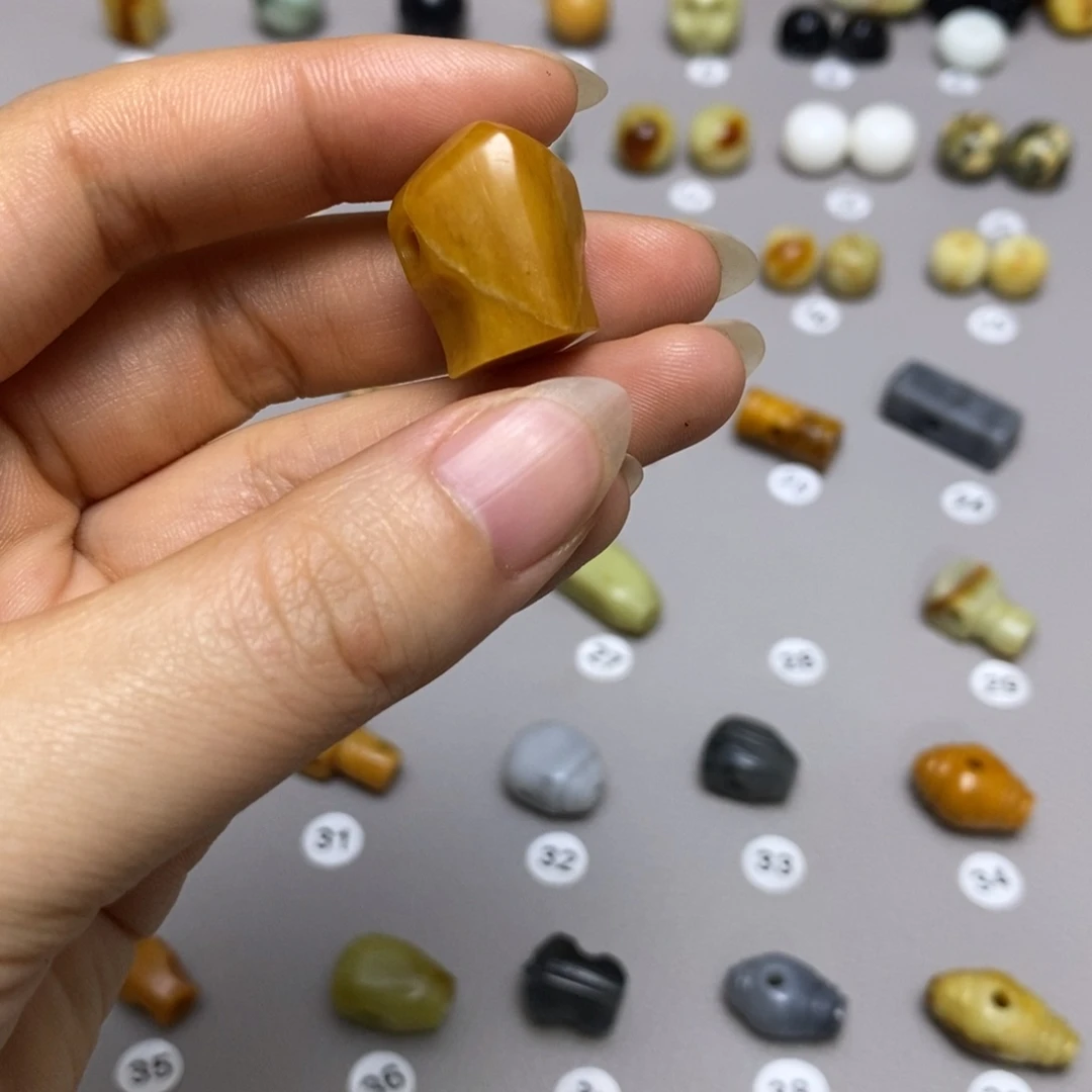 蛇纹石玉配饰合金呼***响