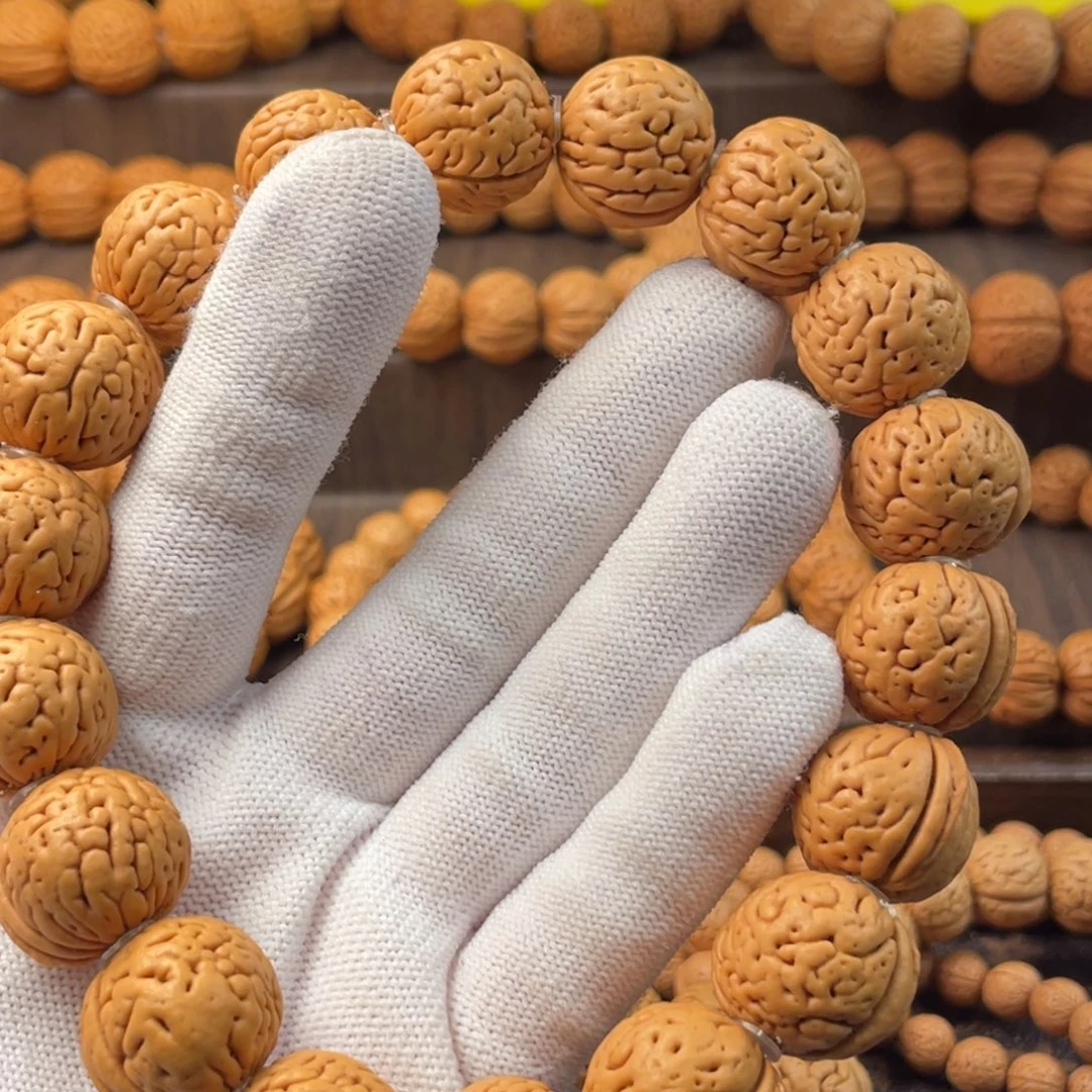 吊坠桃核金鱼肚福利