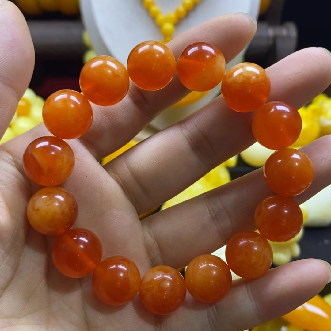 百***收非金属14蜜糖红手串