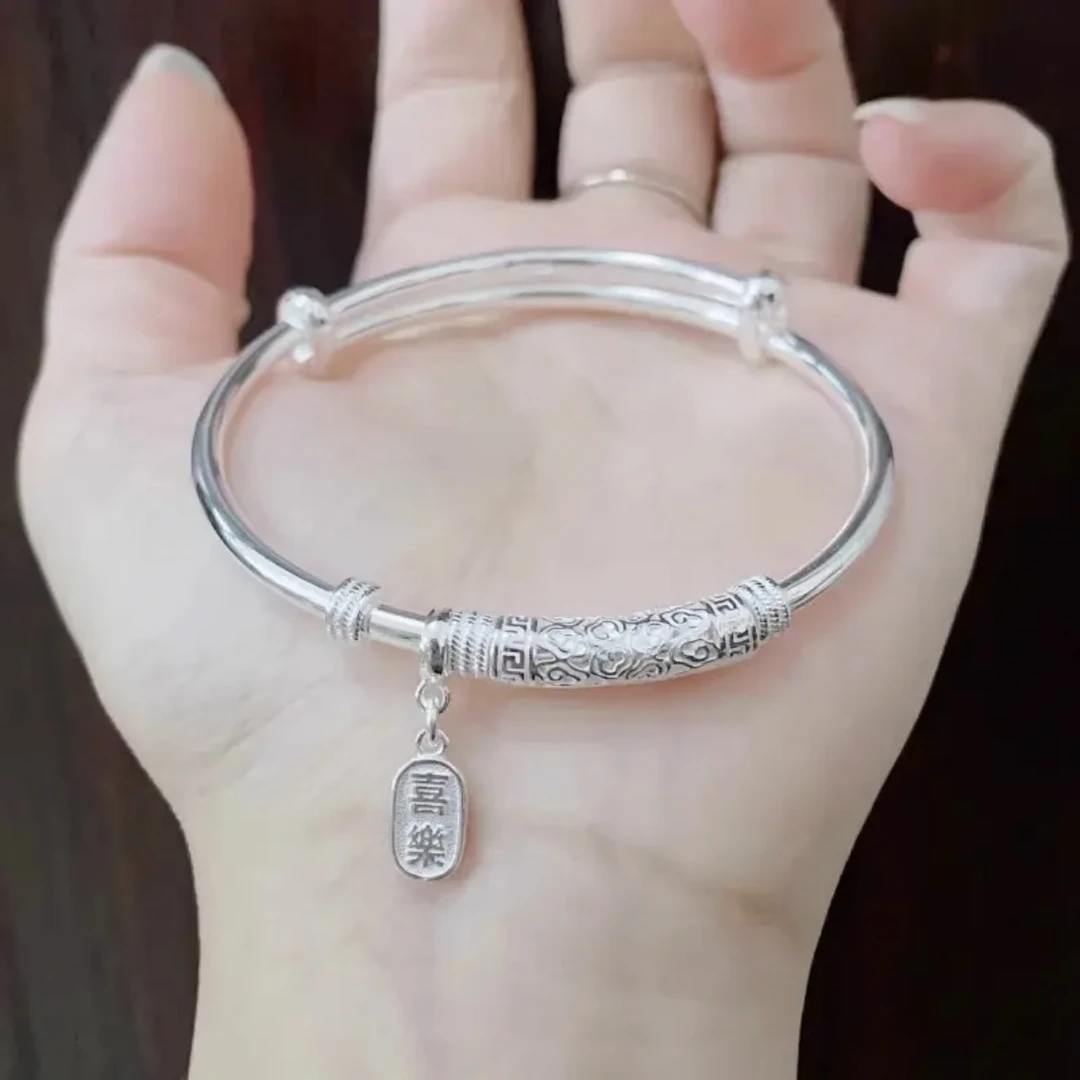 足银999.9（16克）平安喜乐祥云实心可调节推拉女款银手镯