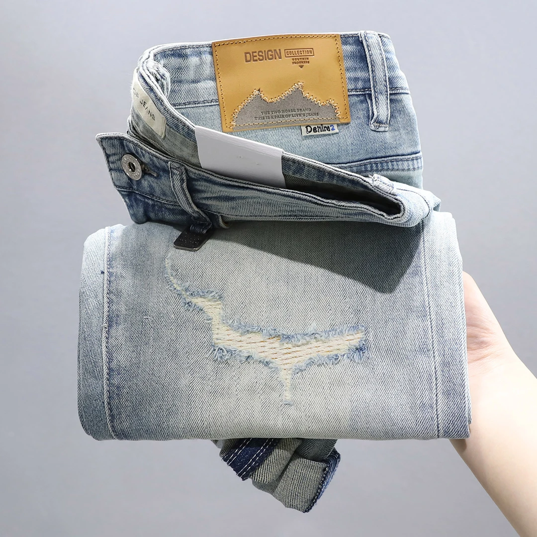 锡芝班拿高端浅蓝色破洞牛仔裤夏季百搭潮牌男士弹力小脚修身裤