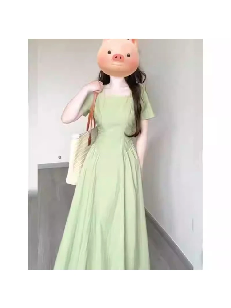 法式复古方领绿色连衣裙女夏季新款设计感褶皱收腰显瘦气质长裙子