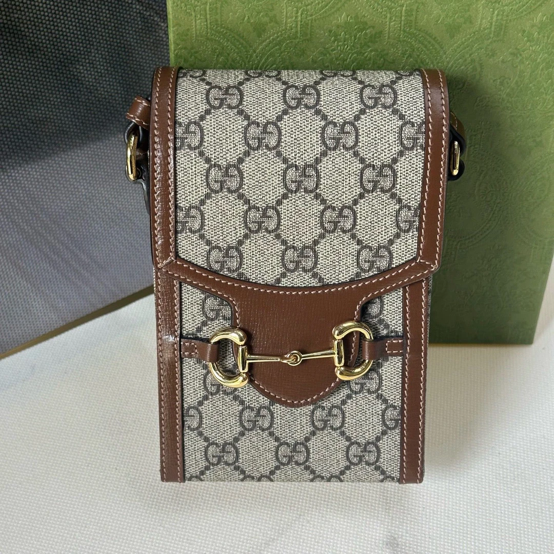 95新 GUCCI/古驰 14530509/KIKIFIFI/1955竖版手机包