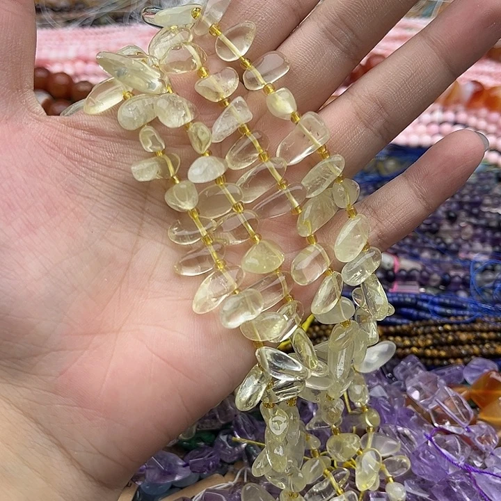 玛瑙/玉髓未镶嵌珠宝半成品一条柠檬晶侧孔长牙