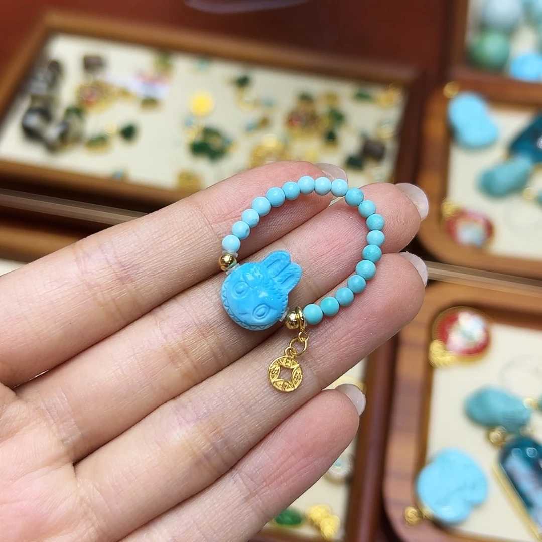 梅***梅绿松石18K金镶嵌戒指