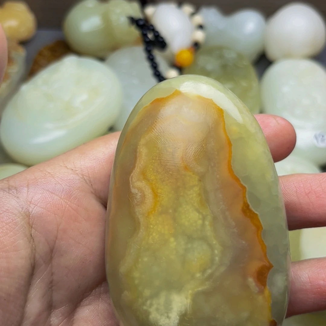 E***i石材方解石手把件