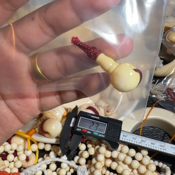 让***足菩提根/象牙果吊坠