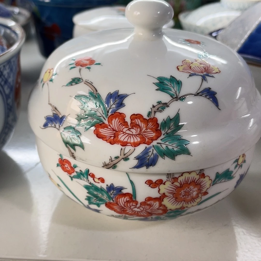 瓷片得**厚我不敢看电视我要把它拍