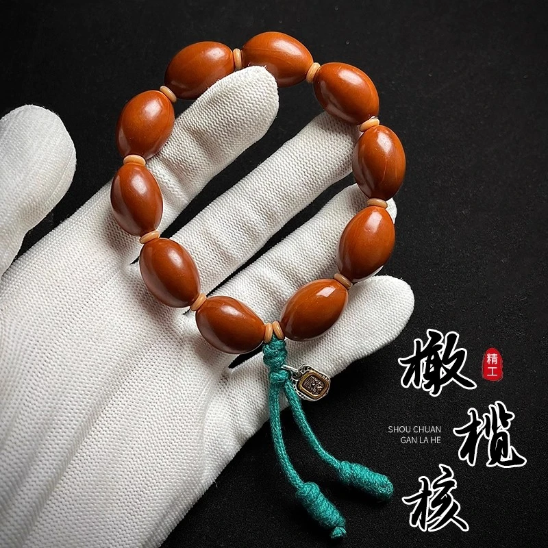 天然橄榄核光珠手串高密素核手工文玩精抛核桃流苏手持男女手链