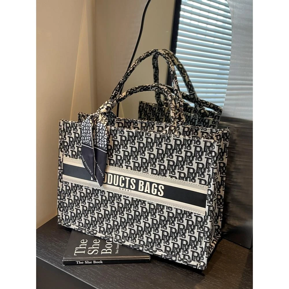 网红高级感帆布单肩包女2025新款潮流手提通勤托特包大容量购物袋