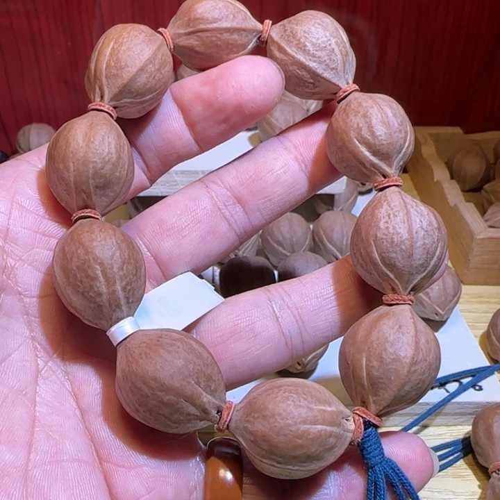 洋***3手串/手链橄榄核2.0×2.6梅林铁核手串