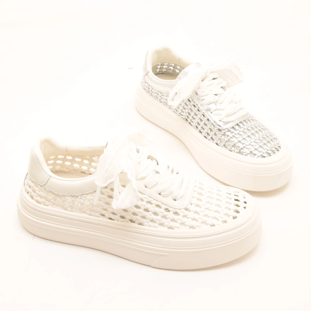 6868春夏新款系带真皮透气镂空小白鞋女编织厚底百搭休闲洞洞板鞋