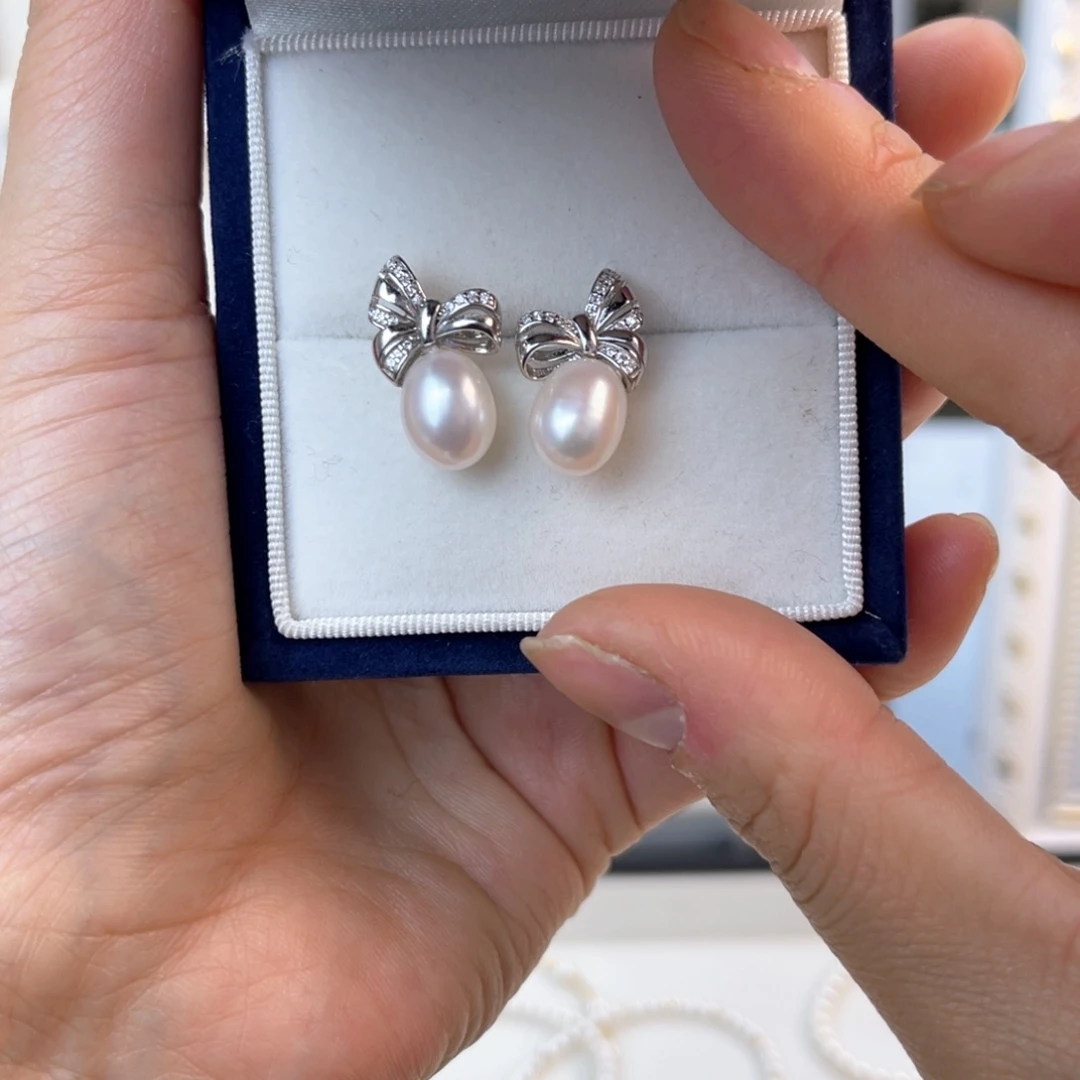 淡水珍珠耳饰银S925镶嵌不*春
