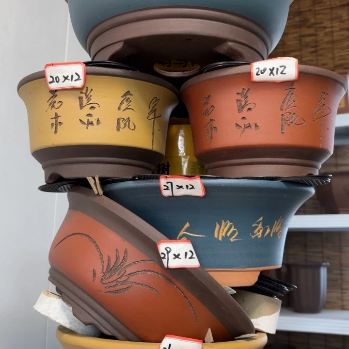 紫砂花盆100-6。