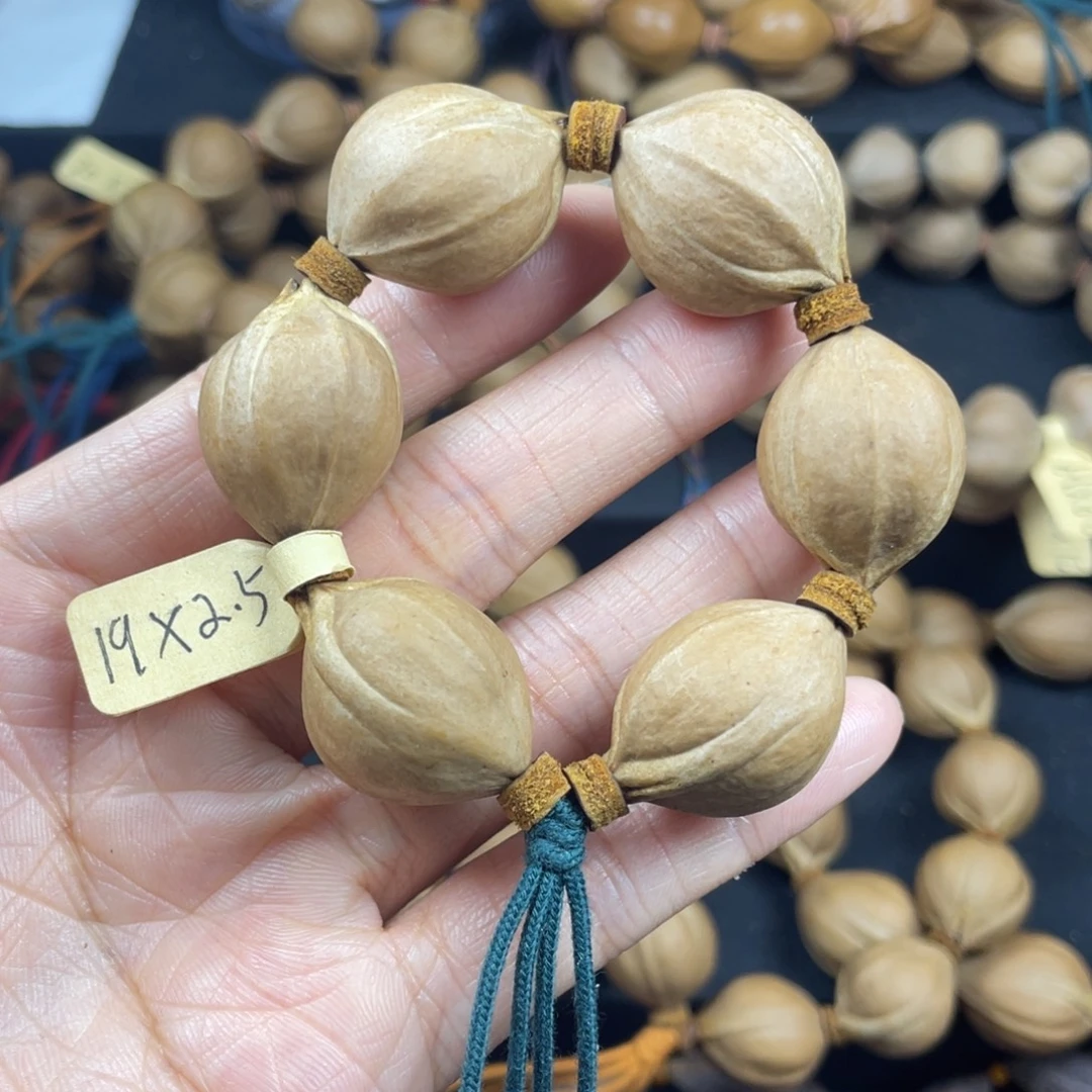 003橄榄核三花19*25