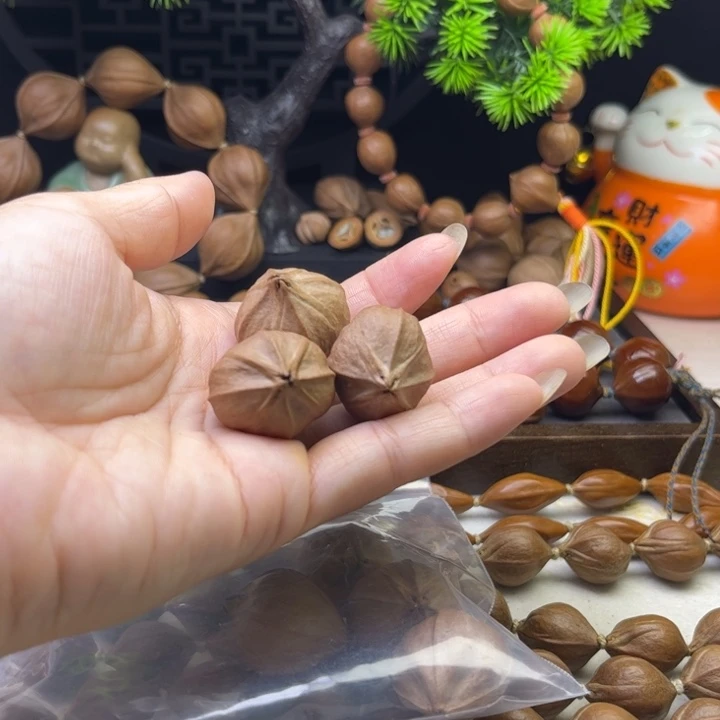 航***上橄榄核手串/手链2.5*2.8原皮四花铁核9颗