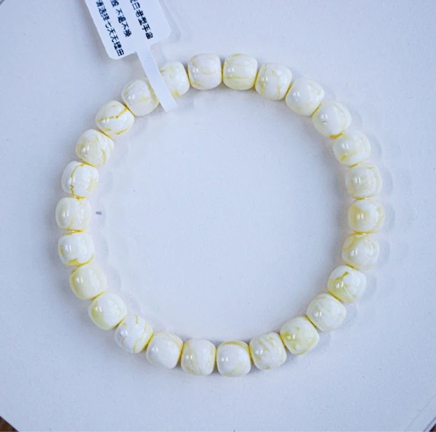 8x7.5mm俄料精品瓷白花老型蜜蜡手串8.14克 精工高桩 蜡质浓郁