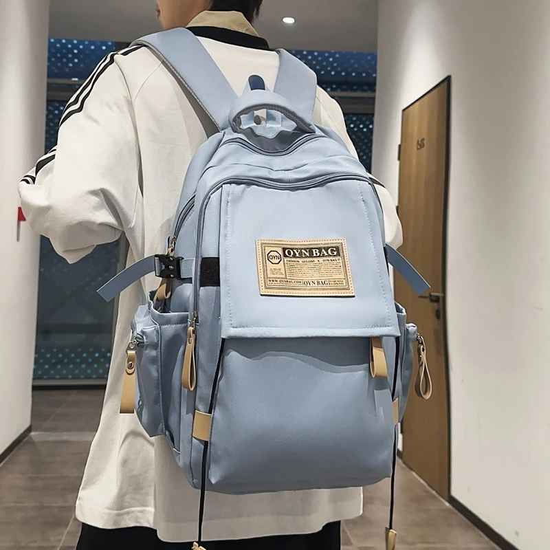 书包女2025新款初中生高中生女生大容量旅游背包大学生男生双肩包