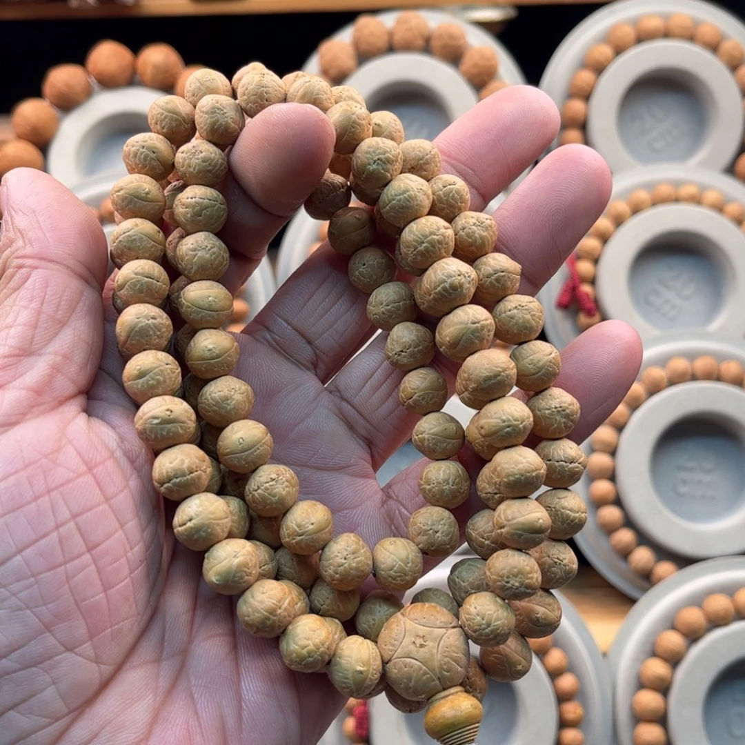 凤眼菩提吊坠10.8-11.1奶油皮同树籽矮桩112颗