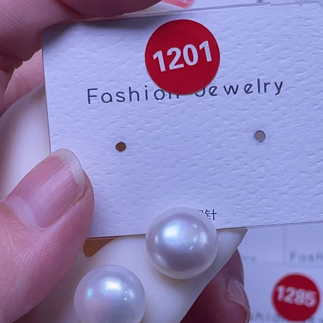 凉****淡水珍珠耳饰银S925镶嵌