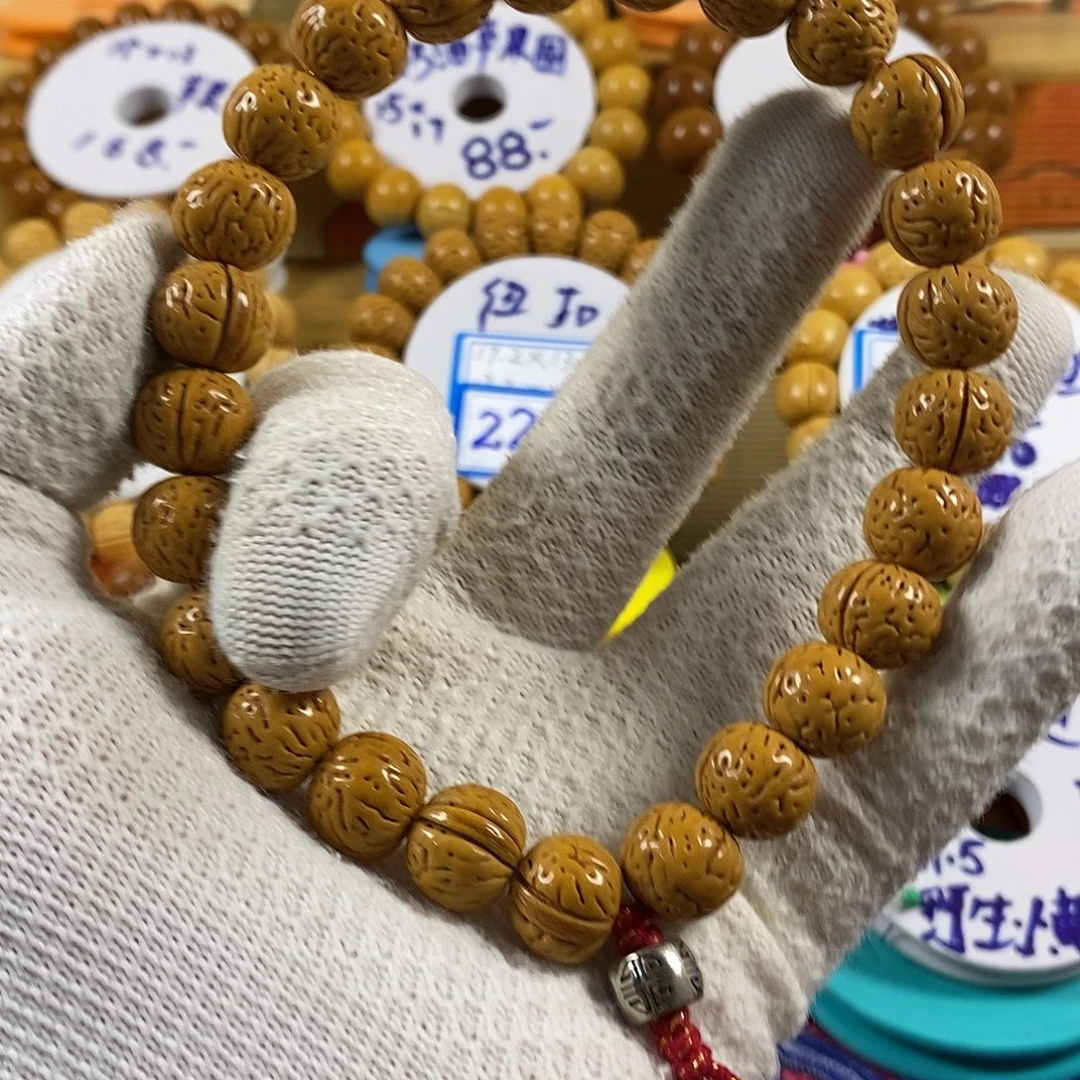 萬***逸桃核盘锦一道筋小黄桃