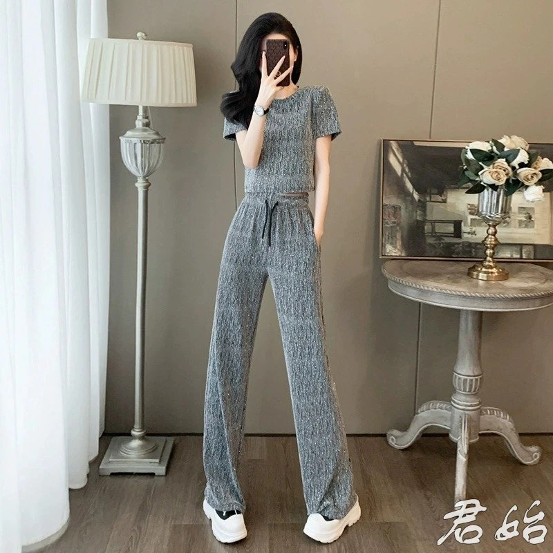 时尚百搭休闲运动套装女夏季洋气显瘦设计感露腰上衣阔腿裤两件套