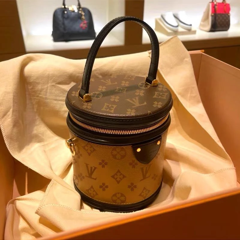 香港品牌女包2025夏季新款百搭流行中古老花发财桶单肩斜挎水桶包