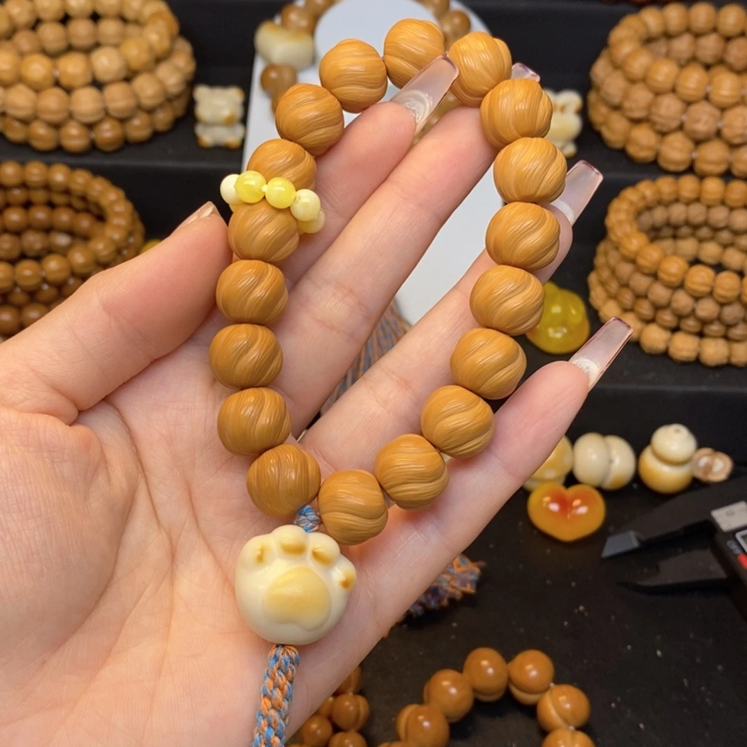 猴头核桃吊坠全品卷卷酥手持➕配饰