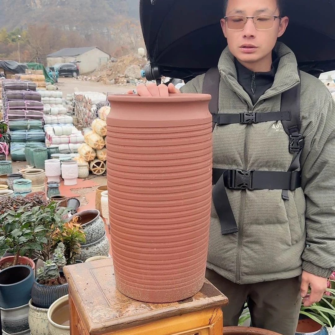 紫砂花盆口21高42（一个红陶