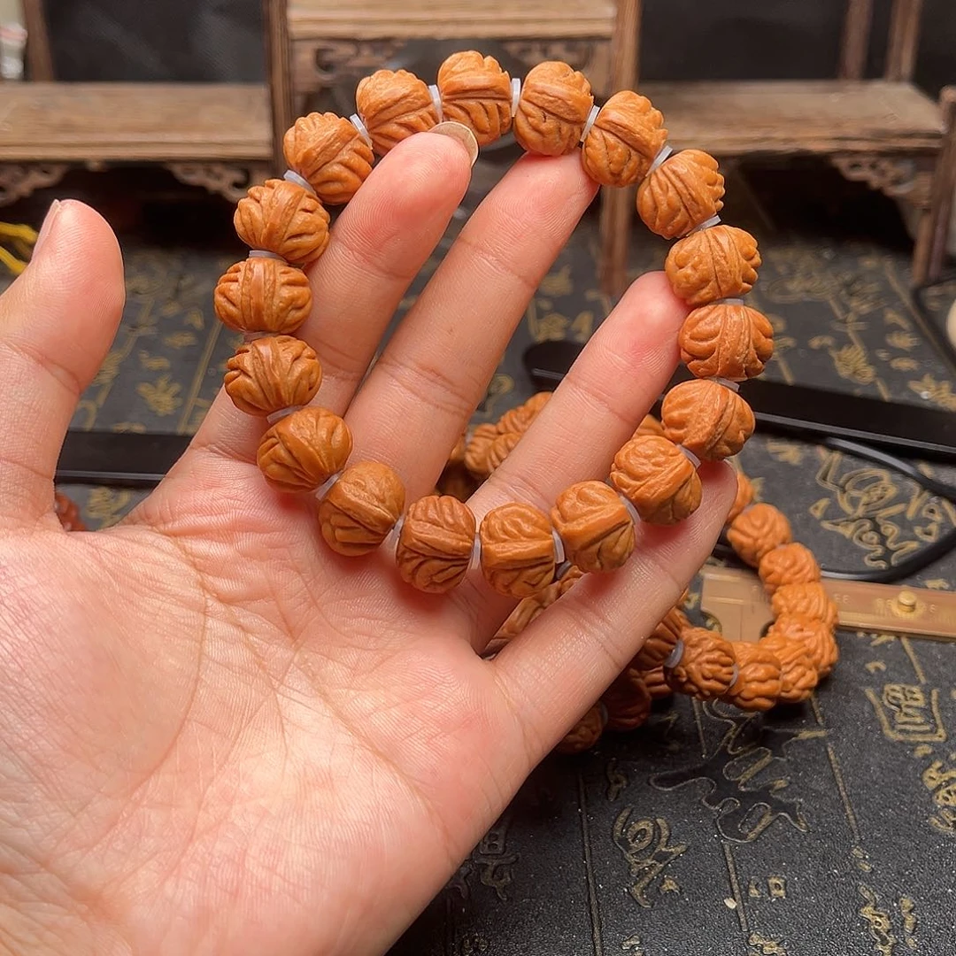 吊坠桃核小金豆手串