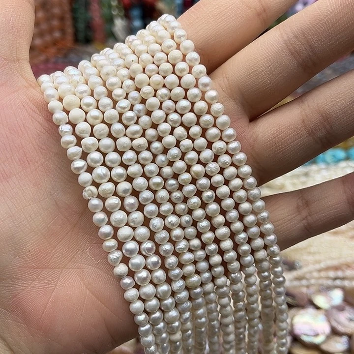 玛瑙/玉髓未镶嵌珠宝半成品一条4mm左右椭圆珍珠有生长纹