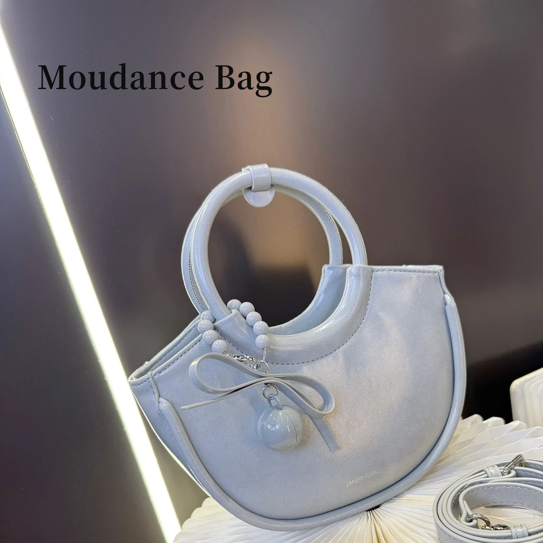 【蝴蝶菜篮】Moudance新款时尚设计师款草篮子洋气百搭9792-1