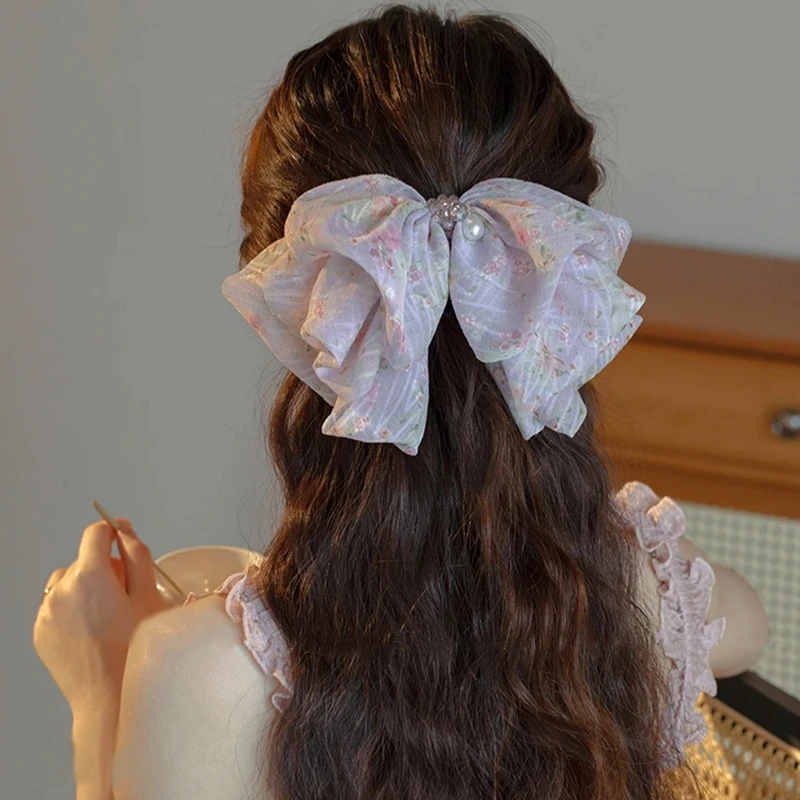 高马尾抓夹女高级感2025新款后脑勺发夹法式气质半扎发蝴蝶结头饰