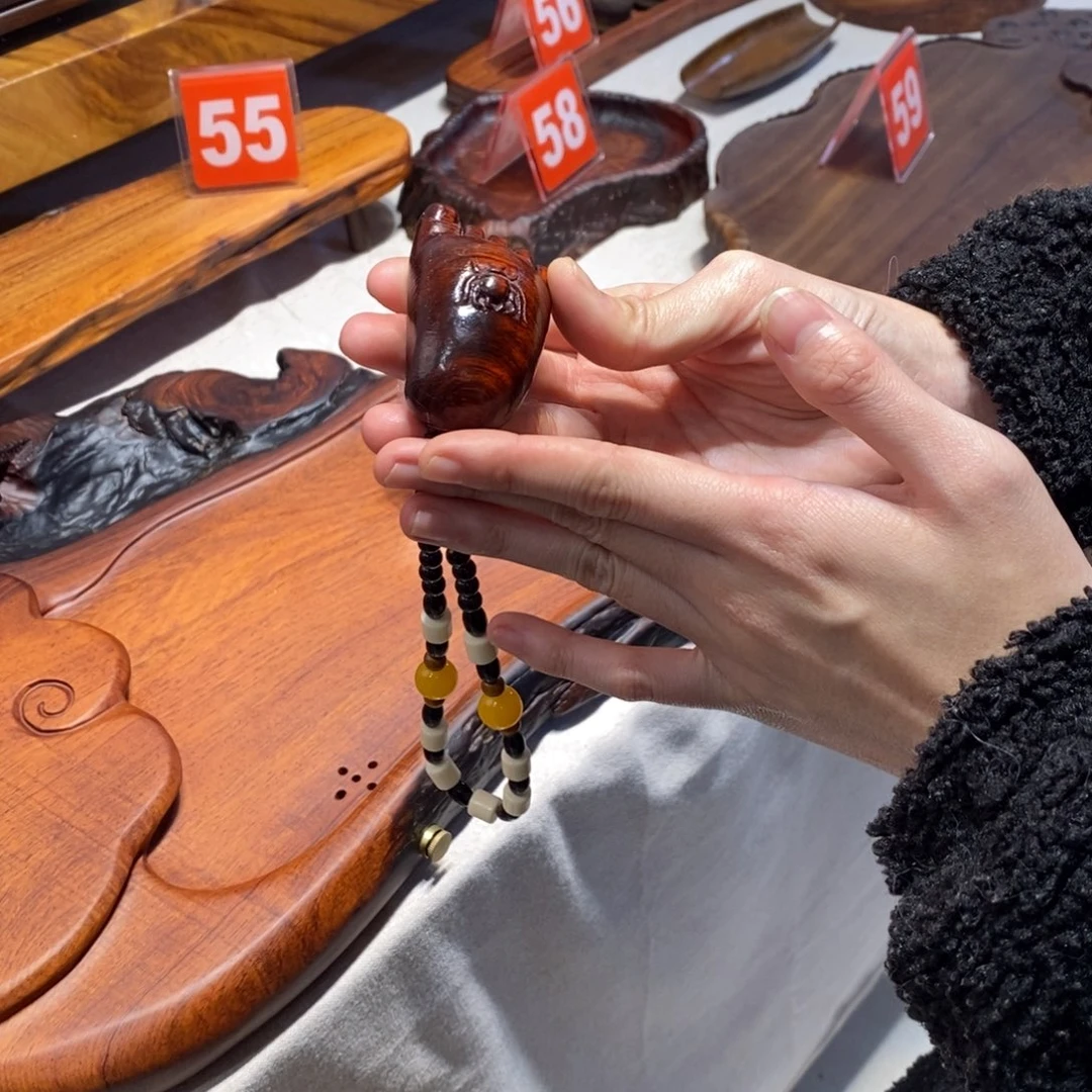 犀角紫檀浮力把件